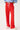 Red sweatpants with a white drawstring on a white background