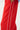 Red pants with white stripes on a white background