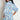 Heir Dress in Song Bird print back and side view, showing the relaxed silhouette, side seam pockets, and loop trim detail at the hem.
