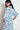 Heir Dress in Song Bird print back and side view, showing the relaxed silhouette, side seam pockets, and loop trim detail at the hem.