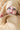Hooded Towel crafted from a soft cotton and bamboo blend featuring a bear ears hood shown in oat wrapped around a baby.