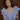 Indi Ruffle Shirt Stripe Cotton portrait view on a model featuring pure cotton in a fine stripe.