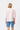 Isabella Shirt Pink full-length back view showcasing the embroidered elbow-length sleeves, ruffled collar, and relaxed cotton fit.
