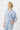 Joanne Shirt Blue three-quarter front view highlighting the pop-over style and relaxed fit.