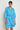 Jostle Dress Lagoon shown in full length featuring pintuck detailing and brass tie ends on the rope belt.