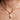 Juliette pearl necklace worn on a model, showcasing the 45cm chain length and organic pearl style.