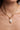 Juliette pearl necklace worn on a model, showcasing the 45cm chain length and organic pearl style.
