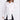 Woman wearing a white button-up shirt and black pants on a white background