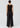 Back view of the Kaspar Layered Tank in chocolate showcasing its clean neckline and relaxed layering details.