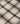 Larder Check Tea Towel featuring a close-up view of the soft textured cotton weave.