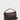 Large Bolster Bag in rich mahogany waxy leather featuring a spacious cylindrical silhouette, short fixed carry handle, and adjustable crossbody strap.