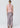 Lattice Skirt in Pink Check shown from the back, featuring an exclusive check print, flat elasticised waist, invisible side zip, and midi length bias silhouette.