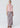 Lattice Skirt in Pink Check featuring an exclusive check print, flat elasticised waist, invisible side zip closure, sleek bias silhouette, and midi length style.