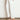 Side angle of the Ledger Jean in elm white crafted in cotton and lyocell, showing a relaxed casual fit, ankle length, and wide cuff at the leg opening.