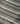 Linen Stripe Teatowel in natural and forest green showing a close-up of the durable striped woven texture.