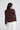 Lorrie Frill Cardigan in chocolate back view, showing the fine knit texture, regular fit silhouette, and frilled hem detail.