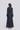 Louna maxi dress back view featuring a silk linen blend maxi classic shirt dress with long sleeves and a self tie rope belt in midnight sky.