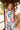 Lucia Top Perfect French lifestyle campaign shot of the sleeveless linen blend top.
