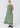 Lume Dress Gingham slip on style 100% linen dress featuring a round neckline, sleeveless design, and elasticised waistband shown in a three-quarter view.