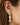 Lythos earring in gold is available at The White Place