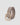 Beige belt with a gold glittery buckle on a light gray background