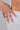 Mali ring set crafted in gold vermeil featuring abstract rings styled on a finger.