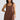 Megan Dress close-up view highlighting the square neckline, contrast topstitching details, and wide shoulder straps with gather detail.