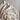 Mila Pointelle Frill Blanket Snow 100% cotton knitted baby blanket featuring a breathable pointelle knit and frill edge shown in a close up view.