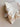 Mila Pointelle Frill Blanket Snow 100% cotton knitted baby blanket featuring a generous size and brand tag detail shown in a folded view.