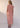 Mira Draped Dress Pink Gingham back view featuring asymmetric sleeves and button detail at the shoulder in textured pink seersucker gingham.