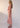Mira Draped Dress Pink Gingham side view featuring asymmetric tucks at the side seams and a relaxed midi length silhouette.