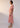 Mira Top Pink Gingham side view featuring a textured seersucker fabric and oversized draped silhouette.