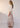 Nixie Skirt Toffee Gingham side view featuring a maxi length and a two-tiered swing silhouette in soft toffee gingham.