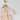 Pippa Cotton Sundress Sorbet Gingham 100% lightweight cotton summer dress featuring soft puff sleeves and a versatile tie detail shown in a close up view.