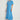 Poem Dress Lagoon featuring a relaxed V-neckline, short tulip sleeves, and a tiered skirt in a vibrant lagoon colour.