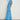 Poem Dress Lagoon shown from the side profile highlighting the midi length and flattering silhouette.