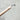 Close-up of the wooden handle and metal hanging loop on the Pointed Head Dish Brush.