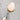 Close-up of the tapered wooden brush head and firm natural bristles of the Pointed Head Dish Brush.