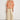 Proclaim Top Marigold Glow featuring a classic linen design with a v-neckline and 3/4 sleeves.