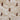 Quilted baby blanket 100x120cm featuring a hand-illustrated teddy bear design close-up showing the soft quilted texture and muted tones.