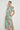 Quote Dress in mint kgari featuring practical side seam pockets, a relaxed shirt dress silhouette, midi length, and a soft tie belt.
