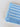 Raised Stripe Blanket Arctic 100% cotton knitted baby blanket featuring raised snow stripes and a frill edge shown in a close up view.