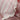 Raised Stripe Tie Romper Sweetpea knitted in a raised sweetpea stripe on a soft snow base featuring leg frills and snap openings shown in a close up view.