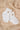 Ribbed Cotton Socks soft cotton-rich blend baby socks in ivory shown in a lifestyle view.