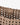 Richmond Crossbody in mushroom colour featuring a close-up of the hand-woven box weave texture and 14 karat light gold-plated magnetic snap hardware.