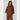 Woman wearing a brown outfit against a white background