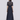 Sana Shirt back view featuring a sheer silk linen organza blend with a high-neck collar, centre back invisible zipper, and removable camisole in midnight sky.