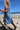 Sandy Terry Dress ocean blue cotton terry towelling dress featuring a contrast pink shell pocket and adjustable rope ties.