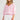 Seaside Top Candy Stripe cotton blend top featuring a round neckline and pink and white stripes with tassel neck ties.