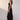 Senne Dress Chocolate side view featuring a body skimming silhouette in a fitted ribbed knit maxi length.
